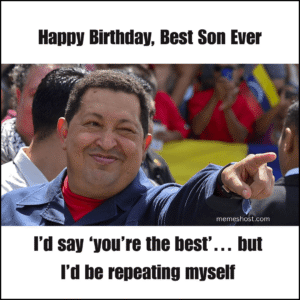 man smiling, winking left eye and pointing finger