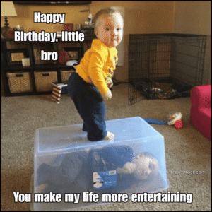 toddler standing on plastic box