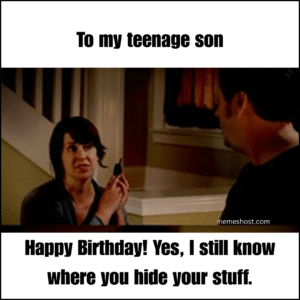 woman holding cell phone and talking to person next to him